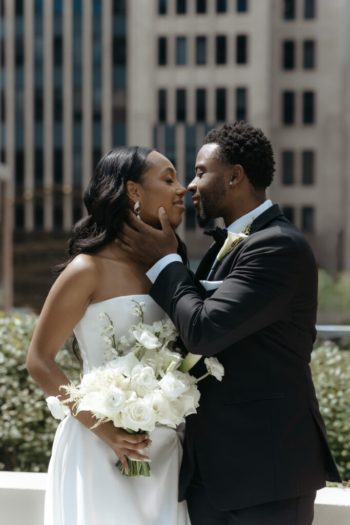 Luxury wedding day inspiration featuring a modern rooftop first look portrait session in downtown Chicago.